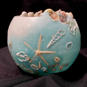Hand crafted with sustainably sourced shells and corals, these gorgeous Shell Lanterns are illuminated with our Pure Soy Votive candles.