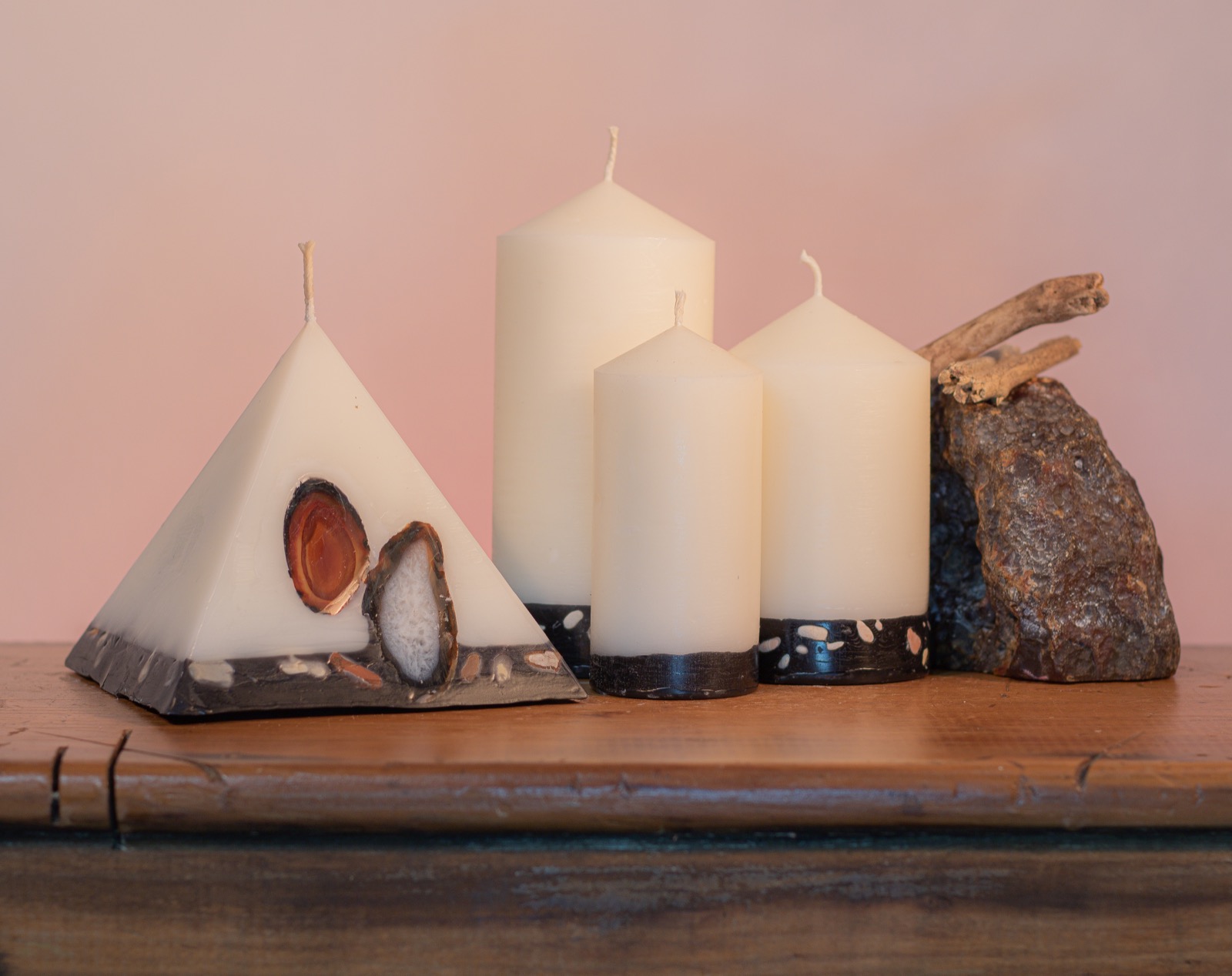 Pillar Candles and Pyramid Candles are colour-coded and scent-matched throughout the range.